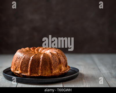 Fresh perfect muffin cake over table. Copy space for text. Ideas and recipes for homemade bakery, breakfast or dessert Stock Photo