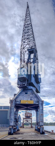 Cockatoo island Sydney, Australia, large industrial ship building crane on dock of historical maritime ship yard Stock Photo