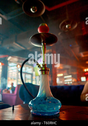 hookah in the smoke is on the table Stock Photo