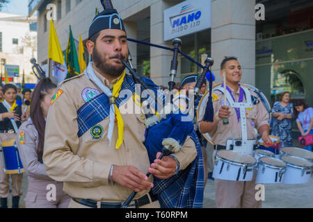 Haifa, Israel - April 27, 2019: Scouts take part in a Holy Saturday parade, part of Orthodox Easter celebration in Haifa, Israel Stock Photo