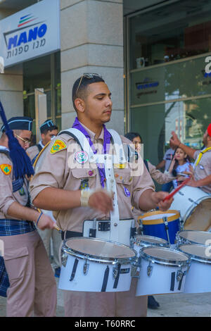 Haifa, Israel - April 27, 2019: Scouts take part in a Holy Saturday parade, part of Orthodox Easter celebration in Haifa, Israel Stock Photo