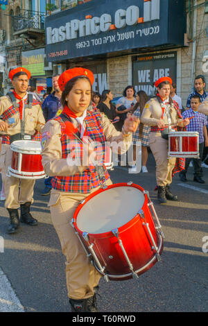 Haifa, Israel - April 27, 2019: Scouts take part in a Holy Saturday parade, part of Orthodox Easter celebration in Haifa, Israel Stock Photo