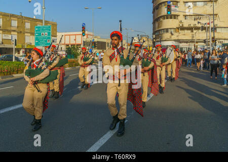 Haifa, Israel - April 27, 2019: Scouts take part in a Holy Saturday parade, part of Orthodox Easter celebration in Haifa, Israel Stock Photo