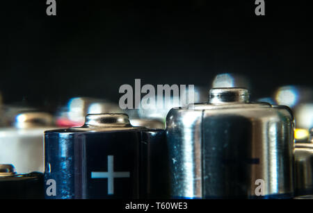 Group of used disposable drain batteries of various size Stock Photo