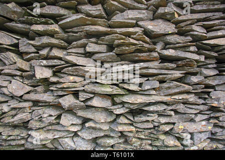 Pieces of Waste Slate at an old slate mine in Cumbria,UK Stock Photo