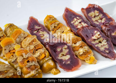 Tasty oriental sweets churchkhela , isolated on white, Georgia Stock Photo