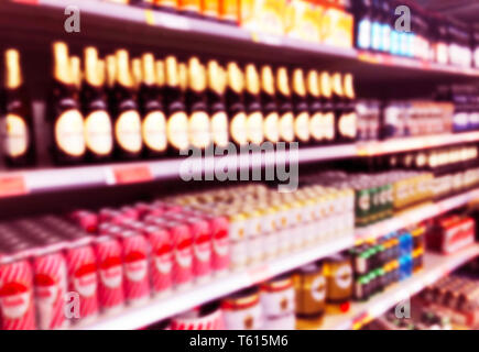 Abstract blurred supermarket store and refrigerators in department store. Interior shopping mall defocused background. Business food. Bokeh light back Stock Photo