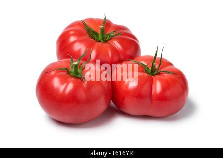 Whole fresh red tomatoes isolated on white background Stock Photo