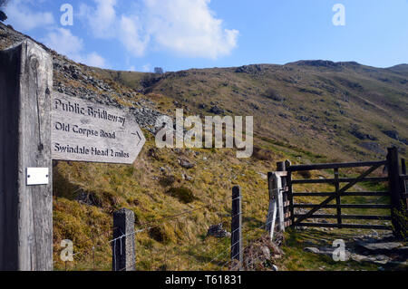 Wooden Signpost for the Public Bridleway to Swindale Head on the Old Corpse Road in Mardale, Lake District National Park, Cumbria, UK. Stock Photo