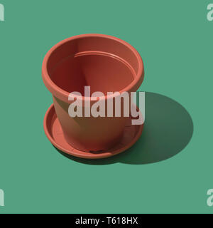 Plastic empty flower pot on green background, gardening and hobby concept Stock Photo
