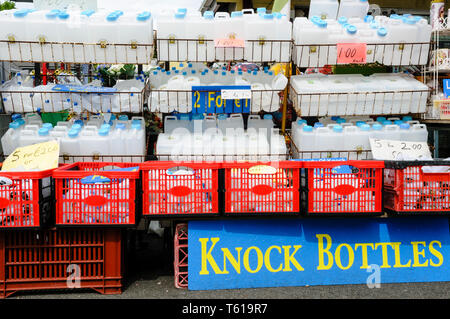 Bottles for holy water on sale at Knock, Ireland. Stock Photo