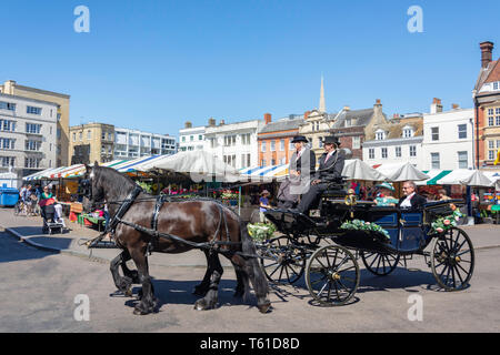 Horse carriage at Cambridge outdoor market, Market Square, Cambridge, Cambridgeshire, England, United Kingdom Stock Photo