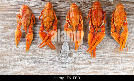 Food banner. Tasty boiled crawfish on wood background Stock Photo