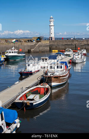 Newhaven harbour and lighthouse in Leith, Edinburgh, Scotland, UK. Stock Photo