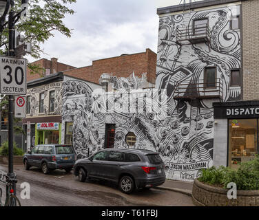 Montreal, Canada -June 24, 2018- Creative graffiti street art murals line the streets and back alleys of Montreal, the largest city in Quebec Stock Photo