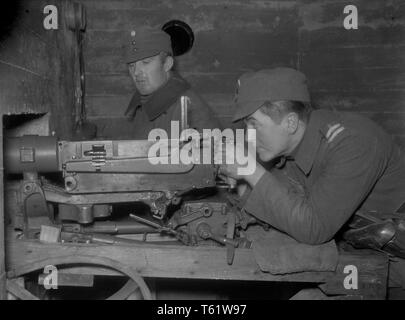 The Winter War. A military conflict between the Soviet union and Finland. It began with a Soviet invasion on november 1939 when Soviet infantery crossed the border on the Karelian Isthmus. About 9500 Swedish volunteer soldiers participated in the war. Here the Karelian Isthmus Finland.  Finnish soldier in the region of the village Summa on the frontline at the Mannerheim line in a machine gun nest. It was here the first Soviet attempt to invade happened in December 1939. The Finns repelled the Soviet main troops. The second Soviet attack on Summa was in February 1940.  Photo Kristoffersson ref Stock Photo