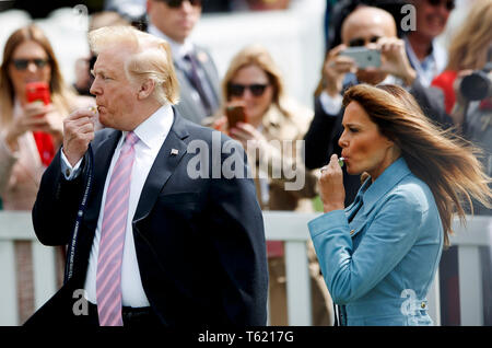 Beijing, China. 22nd Apr, 2019. U.S. President Donald Trump (L) and First Lady Melania Trump attend the annual Easter Egg Roll at the White House in Washington, DC April 22, 2019. Credit: Ting Shen/Xinhua/Alamy Live News Stock Photo