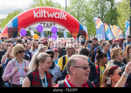 Glasgow, Scotland, UK. 28th April, 2019. Walkers at the start of Kiltwalk Glasgow 2019 in Glasgow Green, a charity event where walkers have three distances to choose from, a Mighty Stride (23 miles), a Big Stroll (14 miles) or the Wee Wander (6 miles).This year 13,000 walkers took part and raised £3.5 million for charity. Credit: Skully/Alamy Live News Stock Photo