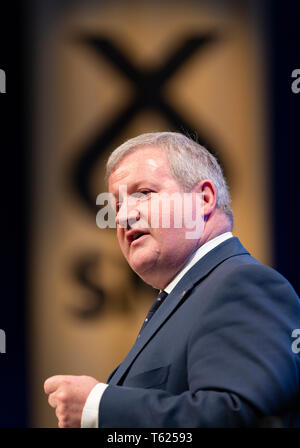 Edinburgh, Scotland, UK. 28 April, 2019. Day 2 of thee SNP ( Scottish National Party) Spring Conference takes place at the EICC ( Edinburgh International Conference Centre) in Edinburgh. Pictured; Ian Blackford MP, Westminster Group Leader for the SNP making address to delegates Credit: Iain Masterton/Alamy Live News Stock Photo