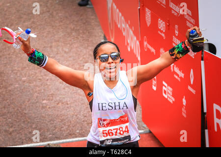 London, UK. 28th Apil 2019. A happy runner. Over 40,000 starters are once again competing in the Virgin London Marathon, including those who take on the race for charities, in running clubs, in memory of loved ones and as personal lifetime goals. Credit: Imageplotter/Alamy Live News Stock Photo