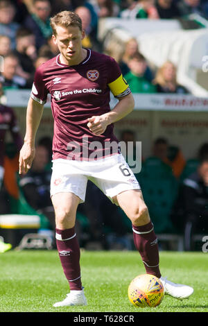 Edinburgh, UK. April 28 2019. Christophe Berra of Hearts  during the Ladbrokes Premiership match between Hibernian and Hearts at Easter Road on April 28 2019 in Edinbugh, UK. Editorial use only, licence required for commercial use. No use in Betting, games or a single club/league/player publication. Credit: Scottish Borders Media/Alamy Live News Stock Photo