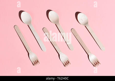 disposable plastic forks, spoons for cafe visitors, top view photo. Stock Photo