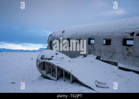 VIK, ICELAND - FEBRUARY 15, 2019: Wreck of the crashed DC 3 plane, covered by snow on a winter day on February 15, 2019 in Vik, Iceland Stock Photo