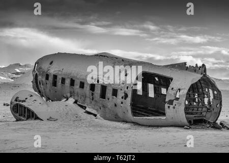 VIK, ICELAND - FEBRUARY 15, 2019: Wreck of the crashed DC 3 plane, covered by snow on a winter day on February 15, 2019 in Vik, Iceland Stock Photo