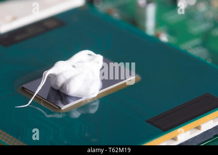 Extruded on the processor chip. For cooling. Computer assembly stage. Part of laptop Stock Photo