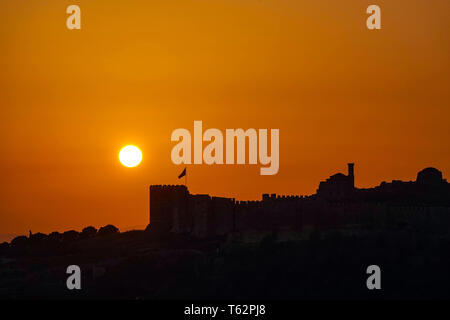 Sunset view of Castle of St John, near site of Ephesus, UNESCO heritage site, Selçuk, Turkey, Stock Photo