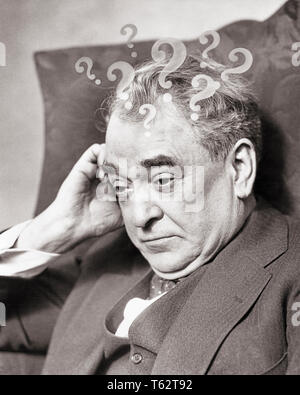 1930s PERPLEXED OLDER MAN WONDERING PUZZLED FACIAL EXPRESSION WITH QUESTION MARKS ABOVE HIS HEAD - c5145 HAR001 HARS ELDER STUDIO SHOT MOODY DECISION HOME LIFE COPY SPACE PERSONS MALES ABOUT EXPRESSIONS TROUBLED FATHERS MIDDLE-AGED B&W PUZZLED SADNESS MIDDLE-AGED MAN WONDER HEAD AND SHOULDERS HIS QUESTIONS CHOICE COMPOSITE DADS QUESTION MOOD ELDERS PONDERING INDECISION CONCEPTUAL GLUM CURIOUS CONTEMPLATE MISERABLE WONDERING BLACK AND WHITE CAUCASIAN ETHNICITY HAR001 MARKS OLD FASHIONED UNCERTAIN Stock Photo