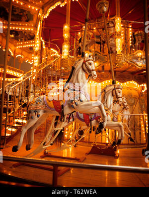 Two old fashioned carousel horses at fairground Stock Photo - Alamy