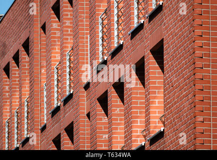 Textured brick wall. Exploring German architexture. Red clay building Stock Photo