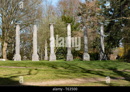 Ancient marble pillars in aachen hillside park. Old age architecture Stock Photo