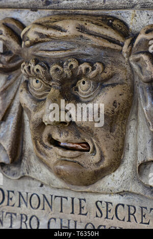 The 'Boca di Leone' (Lion's Mouth), a secret anonymous letterbox used by Venetians for denouncing tax evaders, Doge's Palace, Venice, Italy, Europe.