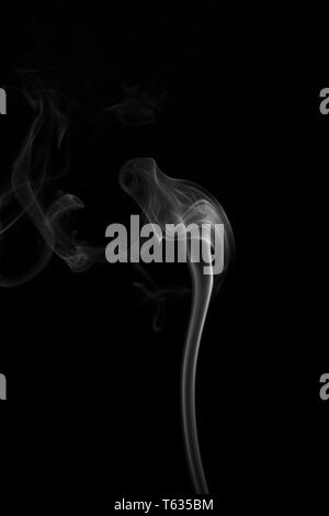 White Smoke on a Black Background Stock Photo