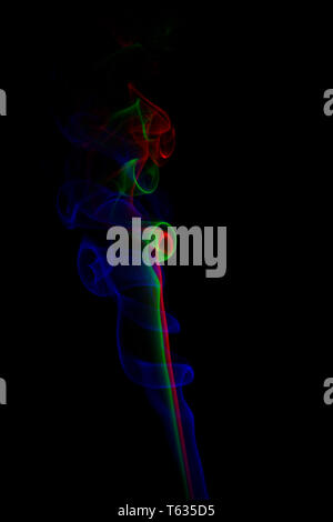 Multicolored Smoke Isolated on Black Stock Photo