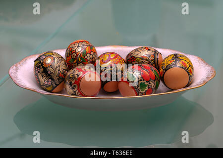 Easter traditions. Compositions with painted Easter eggs. Stock Photo