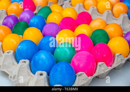 Orthodox Easter. Colorful eggs in carton packaging, close up view, full background Stock Photo