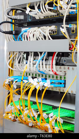 fiber optic datacenter with media converters and optical cables Stock ...