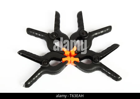 plastic clamps composition on white background Stock Photo