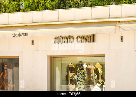 CANNES, FRANCE - APRIL 2019: Exterior of the Roberto Cavalli store on the seafront in Cannes. It is a well known designer brand. Stock Photo