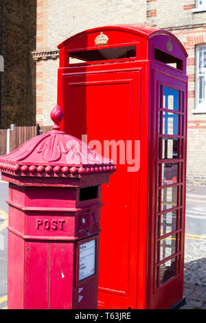 Broadstairs, Kent, UK. An old post box and dis-used telephone box stand on Chandos Square. Stock Photo