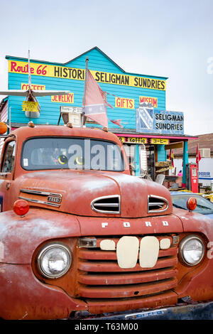 Classic car disguised like the Disney movie in front of historic Seligman Sundries on Old Route 66 in Seligman Historic District, Arizona, USA Stock Photo