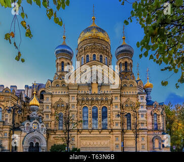 Ornate golden domes and crosses of the Russian Orthodox Church of the Assumption of Mary on the river Neva in Saint Petersburg Russia Stock Photo