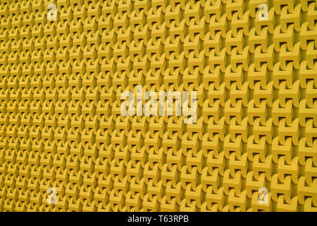 Decorative 3D pattern of the modern building outer wall in mustard yellow color Stock Photo