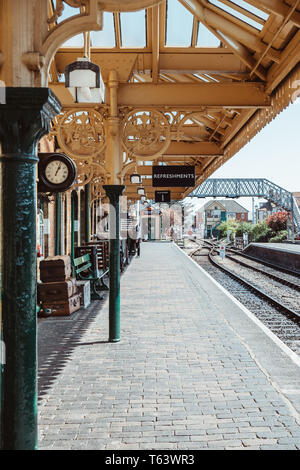 Sheringham, UK - April 21, 2019: View of the retro platform and facilities at Sheringham train station. Sheringham is an English seaside town within t Stock Photo