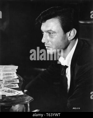 Laurence Harvey as Raymond Shaw THE MANCHURIAN CANDIDATE 1962 director John Frankenheimer novel Richard Condon M.C. Productions / United Artists Stock Photo