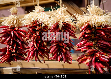 Red Chilli Peppers drying out on the streets of Santa Fe, New Mexico, USA Stock Photo