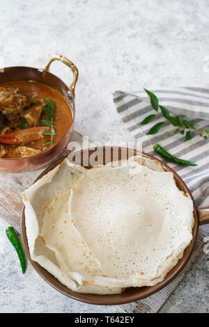 Kerala Appam and crab curry, selective focus Stock Photo